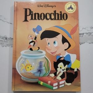 Disneys Pinocchio large hard cover book. good condition. ISBN-10: 0453030262